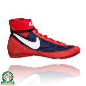 white and red nike freeks